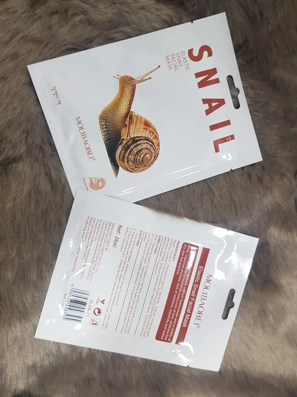 The Molibaobei Elastinc Snail Facial Mask facial mask Box product thumbnail 3